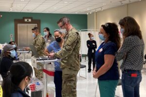 Army medics and Upham's staff giving Covid vaccines