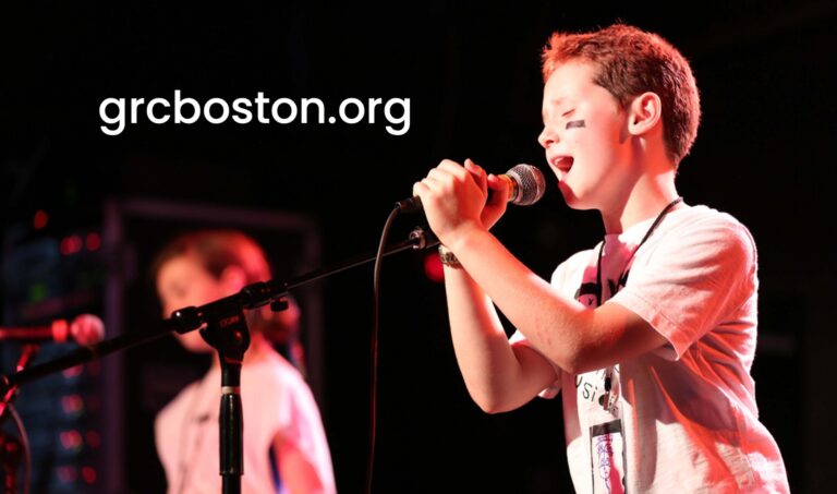 GRCB card with two teenagers singing on stage