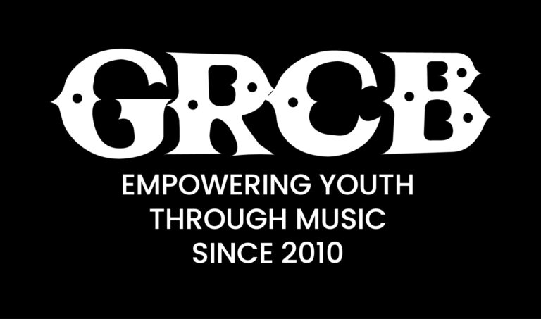 GRCB card that says "GRCB Empowering Youth Through Music Since 2010"