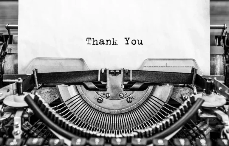 Typewriter with the works "Thank You" on the page